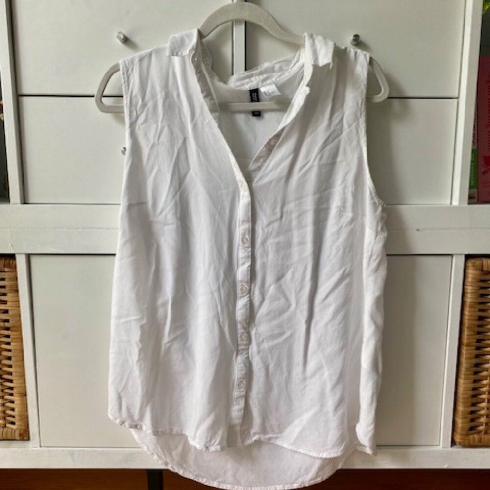 Sleeveless white blouse